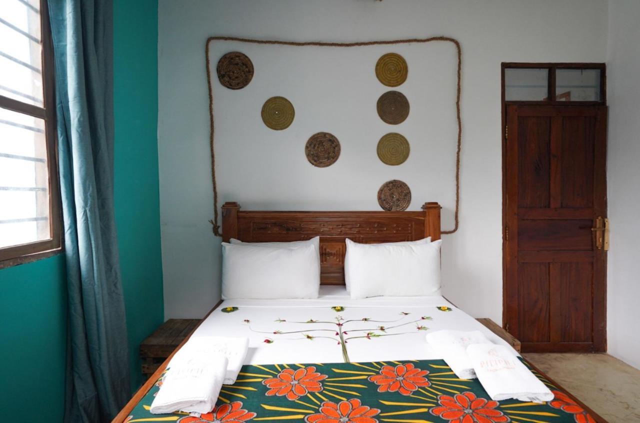 Pili Pili Swahili Lodge จัมเบียนี ภายนอก รูปภาพ